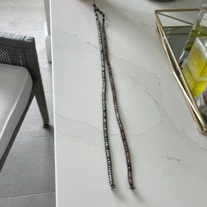 2 beaded wrap bracelets one with more brown colored beads other grey green beads